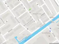 Ambulance met grote spoed naar de Salomon van der Heulstraat in Delft