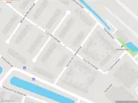 Politie met grote spoed naar de Stationsweg in Weesp vanwege personen te water