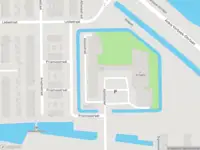 Ambulance met grote spoed naar de Apollostraat in Rotterdam