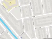 Ambulance met gepaste spoed naar de Vlasakkerstraat in Rotterdam