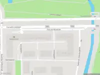 Ambulance met grote spoed naar de Titus van Rijnstraat in Amsterdam