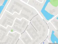 Ambulance met grote spoed naar de Henriëtte Roland Holststraat in Castricum