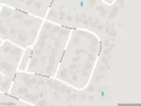 Ambulance met grote spoed naar de Van Breestraat in Baexem