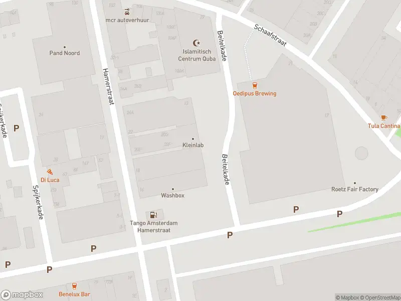 Ambulance met grote spoed naar de Gedempt Hamerkanaal in Amsterdam