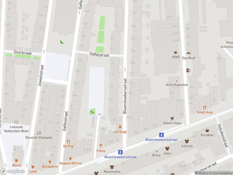 Ambulance met gepaste spoed naar de Bloemkwekersstraat in Rotterdam