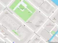 Brandweer met gepaste spoed naar de Ed Pelsterpark in Amsterdam