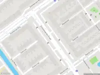 Ambulance met grote spoed naar de Schollevaartse Dreef in Rotterdam