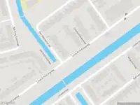 Ambulance met grote spoed naar de Louis Armstrongweg in Rotterdam