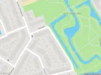 Ambulance met grote spoed naar de Architect Luthmannpark in 's-Gravenhage