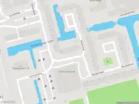 Ambulance met grote spoed naar de Sjanghailaan in Rotterdam