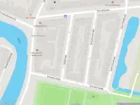 Ambulance met gepaste spoed naar de Rakstraat in Rotterdam