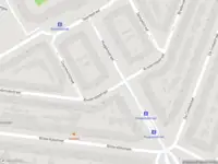 Ambulance met grote spoed naar de Huygensstraat in Rotterdam