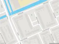 Ambulance met gepaste spoed naar de Albert Cuypstraat in Capelle aan den IJssel