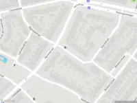 Ambulance met gepaste spoed naar de Tulpenstraat in Leiden