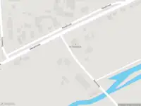 Politie naar de Melkweg in 's-Gravendeel vanwege personen te water