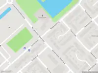 Ambulance met grote spoed naar de Middenwetering in Krimpen aan den IJssel