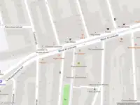 Ambulance met gepaste spoed naar de West-Kruiskade in Rotterdam