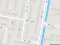 Ambulance met gepaste spoed naar de Bruinissestraat in Rotterdam