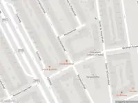 Ambulance met gepaste spoed naar de Heulstraat in Rotterdam