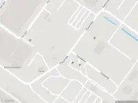 Ambulance met grote spoed naar de Coenhavenweg in Amsterdam