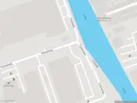 Ambulance met gepaste spoed naar de Schieweg in Delft