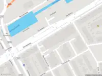 Ambulance met grote spoed naar de Donker Curtiusstraat in Rotterdam