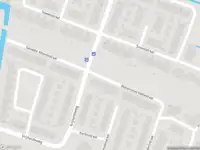 Ambulance met gepaste spoed naar de Kartinistraat in Haarlem