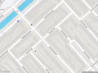 Ambulance met grote spoed naar de Develstraat in Rotterdam