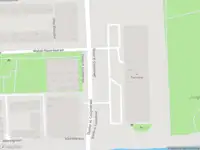 Ambulance met grote spoed naar de Adolphine Eduardine Kokplantsoen in Amsterdam