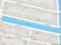 Ambulance met grote spoed naar de Prinsengracht in Amsterdam