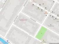 Ambulance met grote spoed naar de Erasmusstraat in Rotterdam