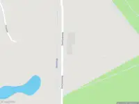 Brandweer met gepaste spoed naar de Goorloopweg in Helmond vanwege een buitenbrand