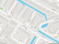 Ambulance met grote spoed naar de Botterhof in Rozenburg