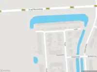 Ambulance met grote spoed naar de Inundatie in Vuren