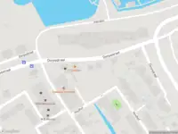 Ambulance met grote spoed naar de Dorpsstraat in Streefkerk