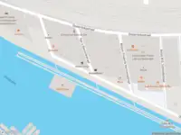 Ambulance met gepaste spoed naar de Harry Banninkstraat in Amsterdam