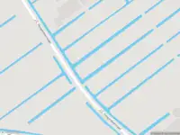 Politie met grote spoed naar de J.C. Hoogendoornlaan in Bodegraven vanwege voertuigen te water