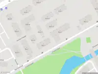 Ambulance met gepaste spoed naar de Darlingstraat in Amsterdam