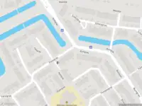 Ambulance met grote spoed naar de Parelgras in Spijkenisse