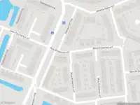 Ambulance met grote spoed naar de Mina Krüseman-erf in Dordrecht