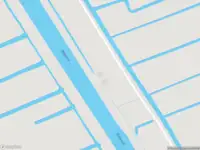 Politie naar de Portengense Zuwe in Kockengen vanwege voertuigen te water