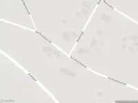 Brandweer met gepaste spoed naar de Oud Woeziksestraat in Wijchen vanwege stormschade