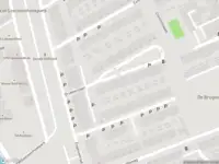 Ambulance met grote spoed naar de Engelsestraat in Delft