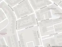 Ambulance met grote spoed naar de Van der Helststraat in Zaandam