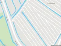 Ambulance met gepaste spoed naar de Stationsweg in Lisse