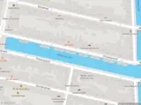 Ambulance met gepaste spoed naar de Prinsengracht in Amsterdam