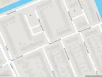 Ambulance met grote spoed naar de Albert Cuypstraat in Capelle aan den IJssel