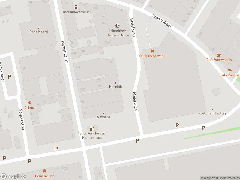 Ambulance met grote spoed naar de Gedempt Hamerkanaal in Amsterdam