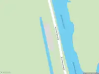 Brandweer met gepaste spoed naar de Arembergergracht in Belt-Schutsloot