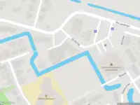 Ambulance met grote spoed naar de De Hertog in Koedijk